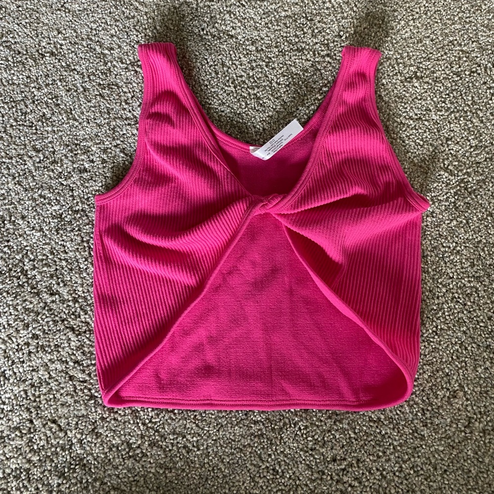 Hot pink crop top.